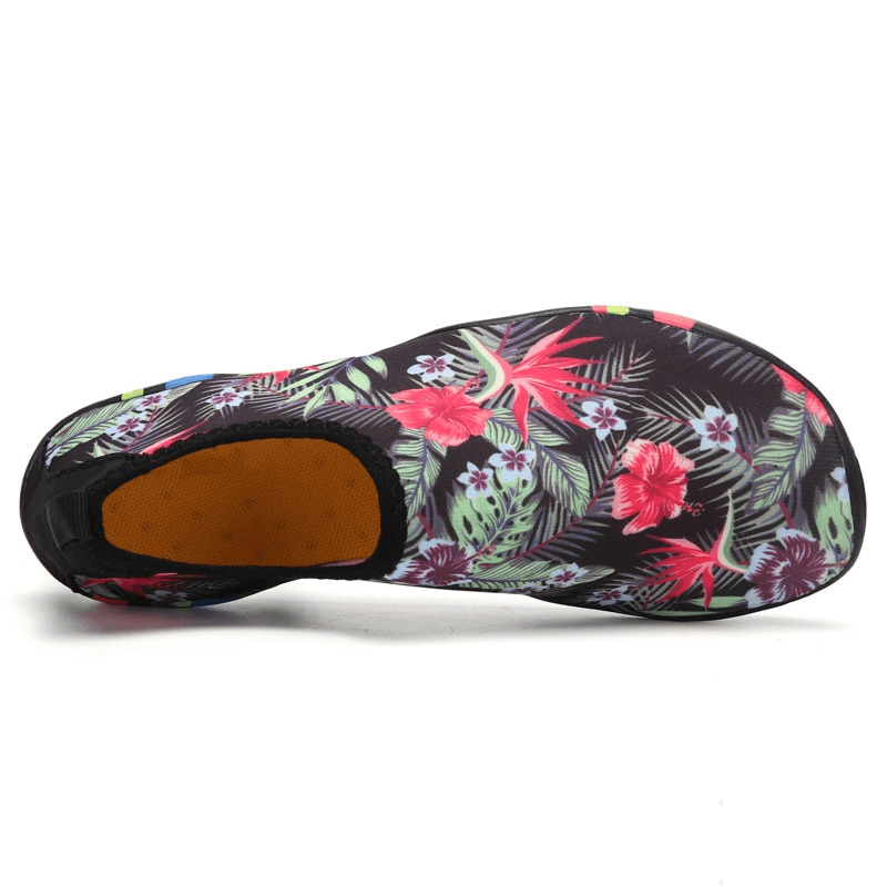 "Unisex quick-dry beach shoe with tropical print, showcasing non-slip rubber sole for safe beach activities."