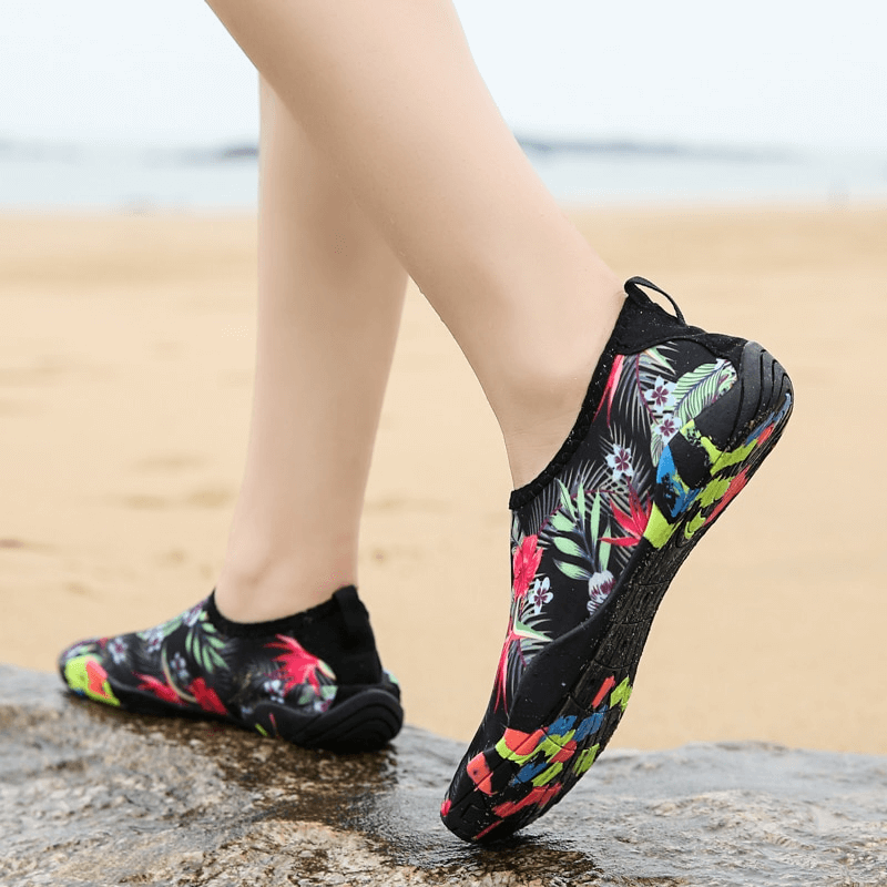 Unisex printed non-slip beach shoes on sand, quick-dry and stylish footwear perfect for beach days.