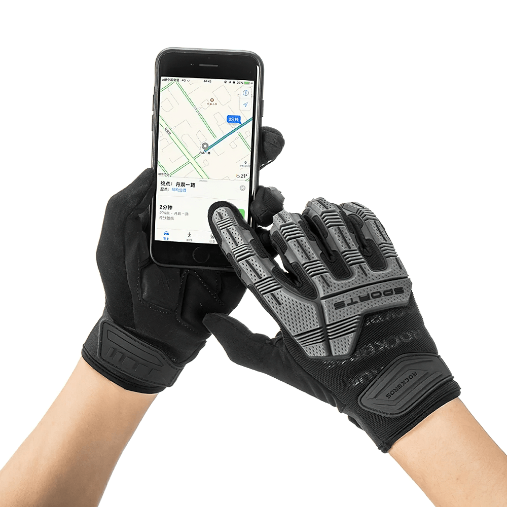 Person wearing tactical gloves SF2629 using a touchscreen smartphone, showcasing durability and touchscreen compatibility.