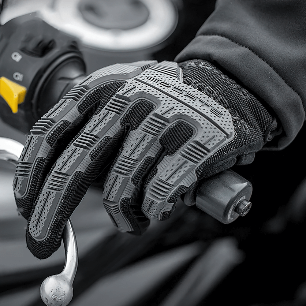 Close-up of tactical gloves SF2629 on handlebar, showcasing shock absorption, enhanced grip, and touchscreen features for outdoor use.