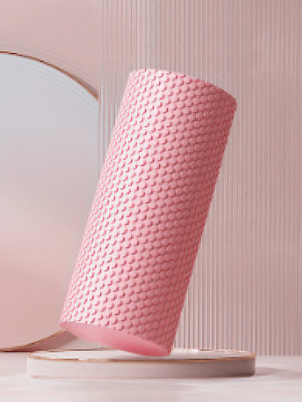 Pink textured EVA yoga roller for muscle relief, ideal for post-workout recovery and flexibility. Perfect for beginners and pros.