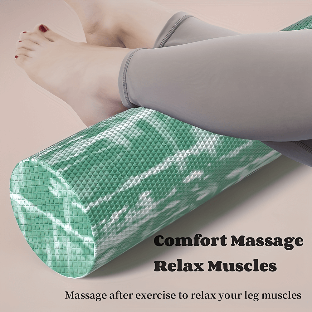 Person using green textured foam roller on legs for muscle relaxation post-exercise. Comfort massage and relaxation tool for fitness.