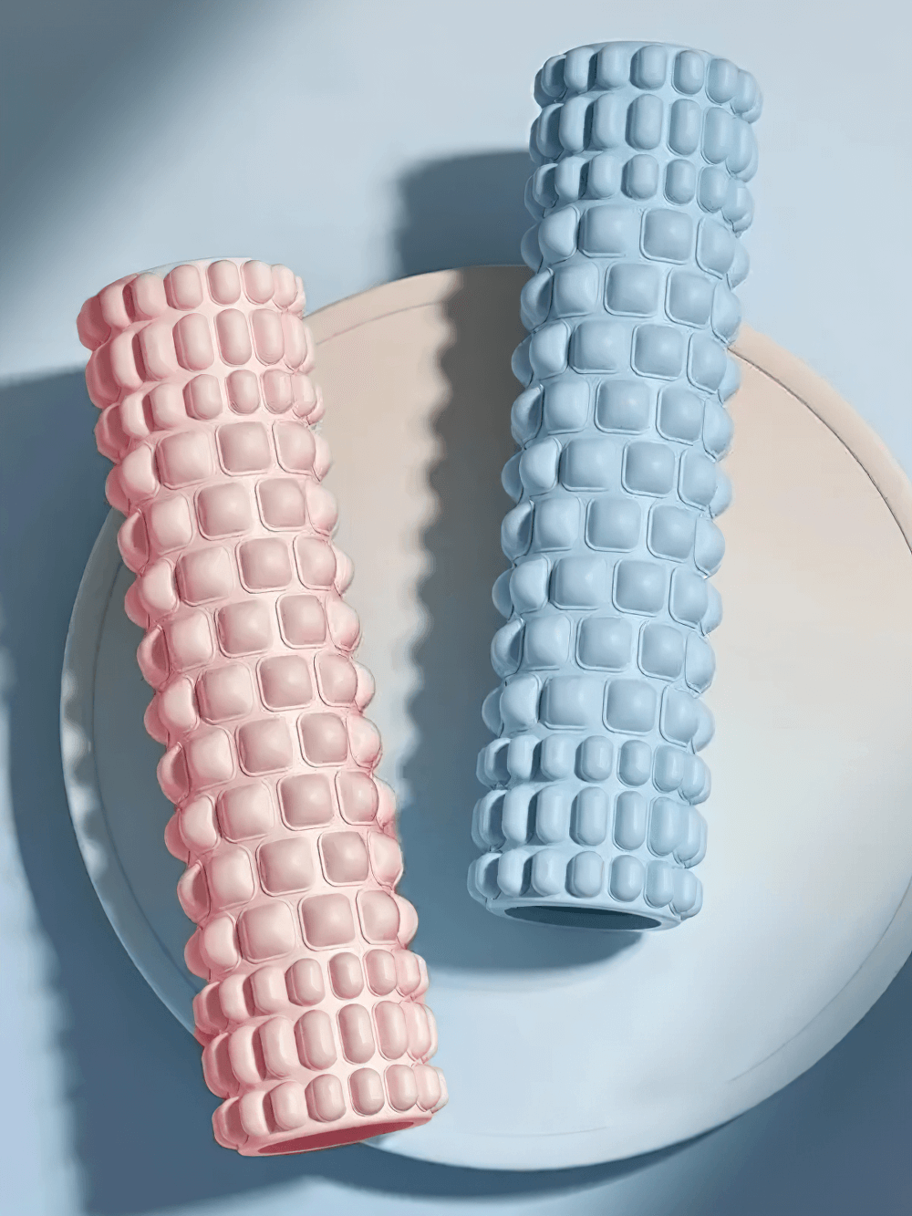 Two Textured Yoga Foam Roller for Deep Muscle Massage - SF3491 in pink and blue color on a round surface
