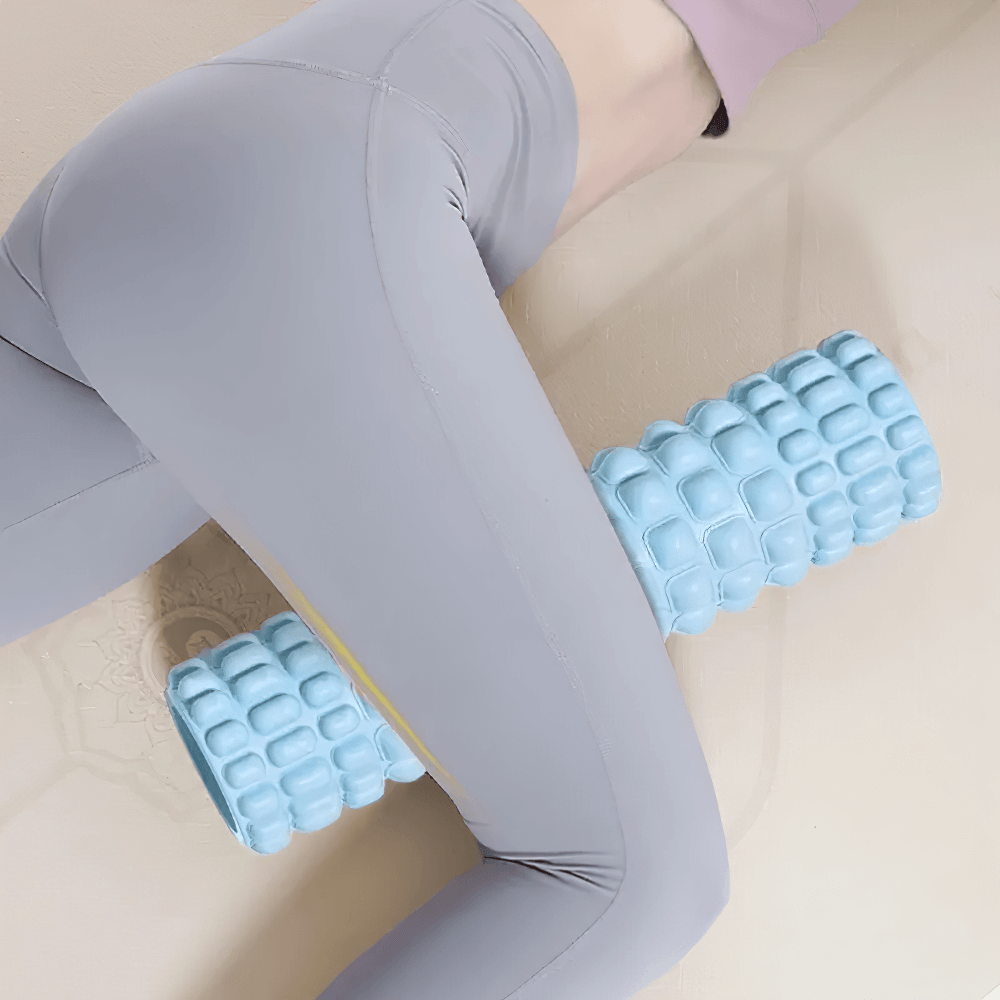 Person using Textured Yoga Foam Roller for Deep Muscle Massage - SF3491 during post-workout recovery.