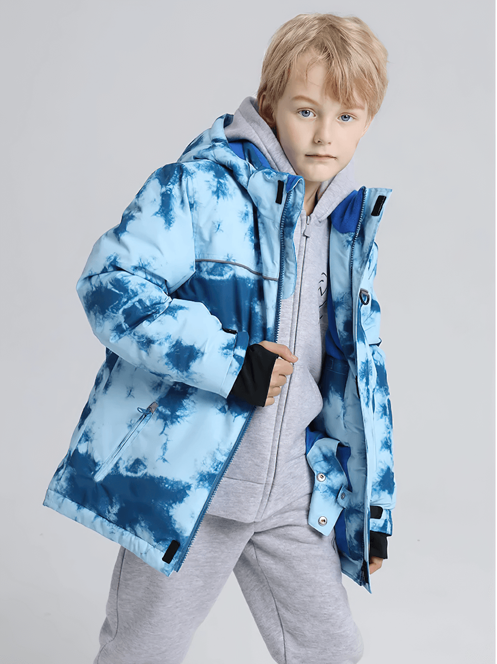 Boy wearing Thermal Coldproof Skiing Jacket for Snow Sports - SF3581, showcasing warmth and style for snowboarding.