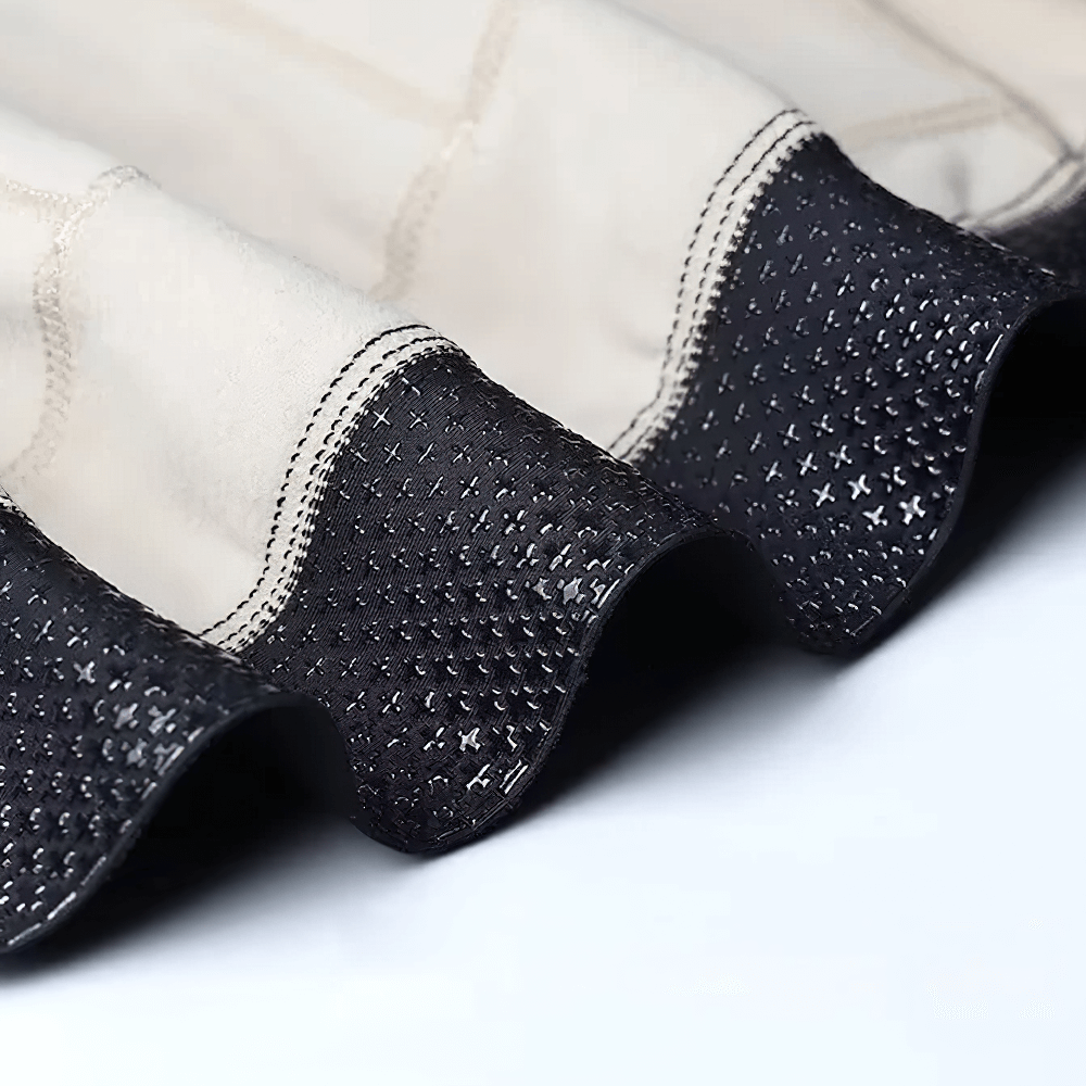 Close-up of the Thermal Cycling Jacket's windproof and breathable fabric texture, showcasing the intricate stitching and durable material.