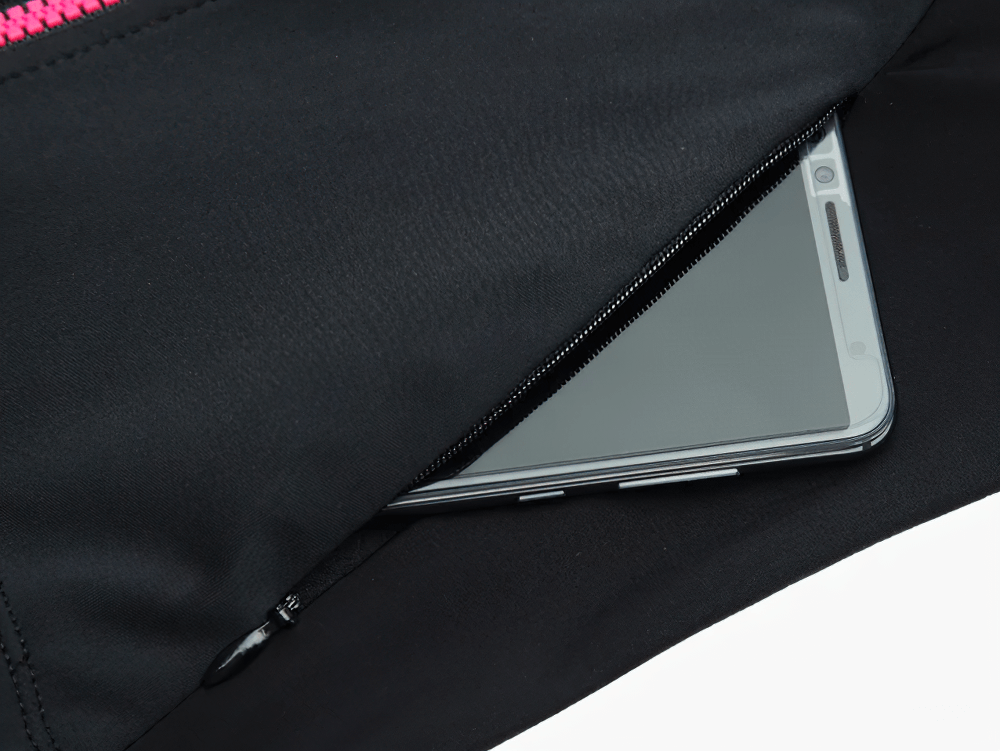 Close-up of a secure zipper pocket on thermal cycling jersey with a phone inside.