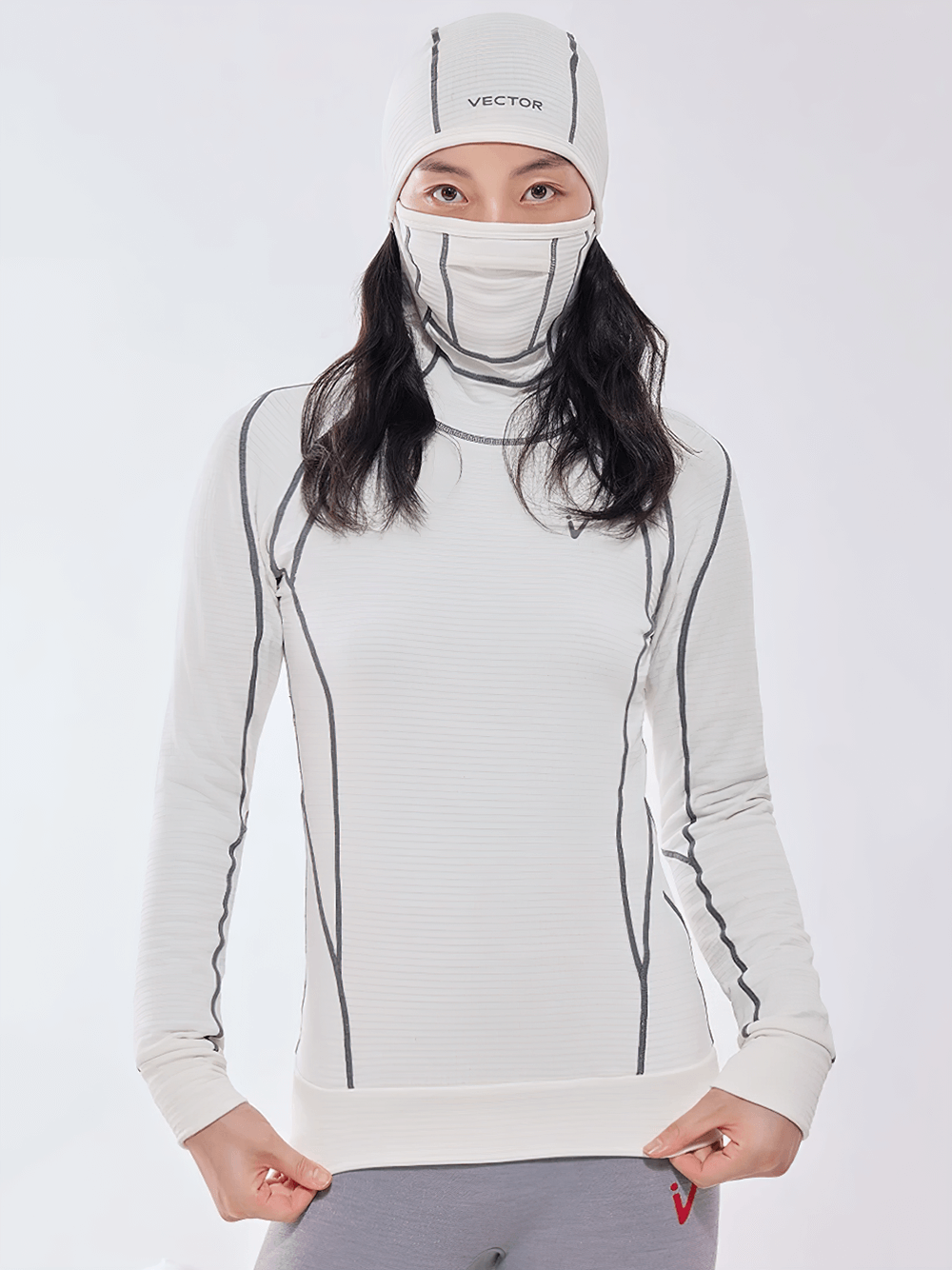 Thermal hooded top with built-in mask and nasal vents, perfect for winter sports. Features stretch panel design and breathable fabric.