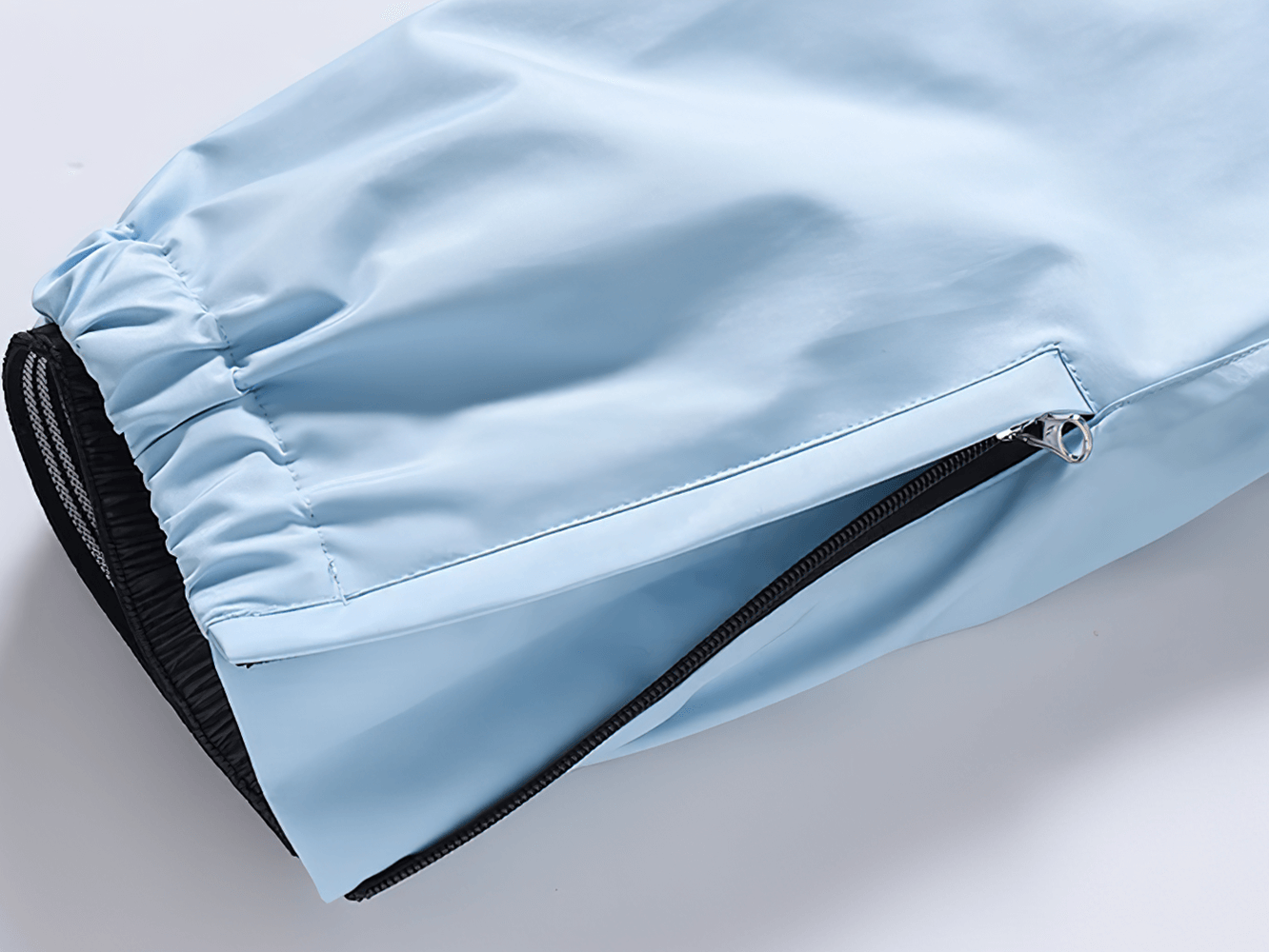 Close-up of light blue Thermal Ski Bib Trousers for Boys and Girls - SF3793, showing zippered detail for skiing and winter play.