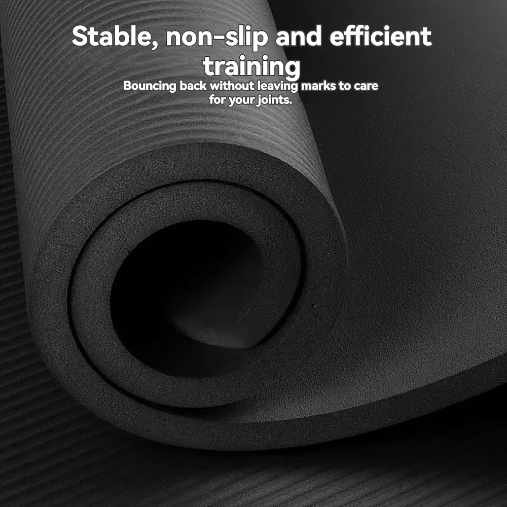 Close-up of a thick black NBR yoga mat showcasing its textured, non-slip surface for joint support during workouts.