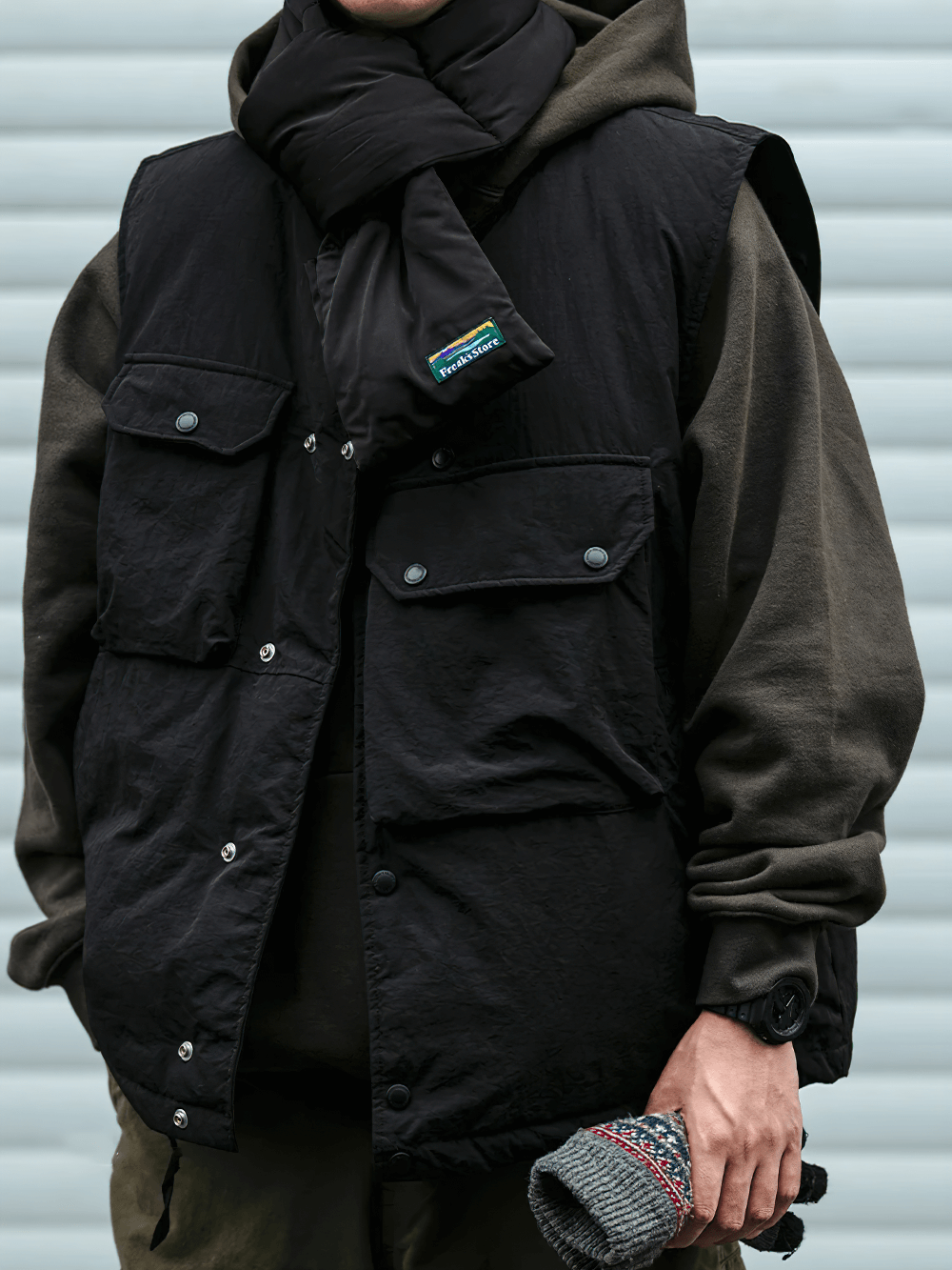 Outdoor-ready nylon duck down vest with pockets, perfect for layering, single-breasted closure, ideal for casual adventures.