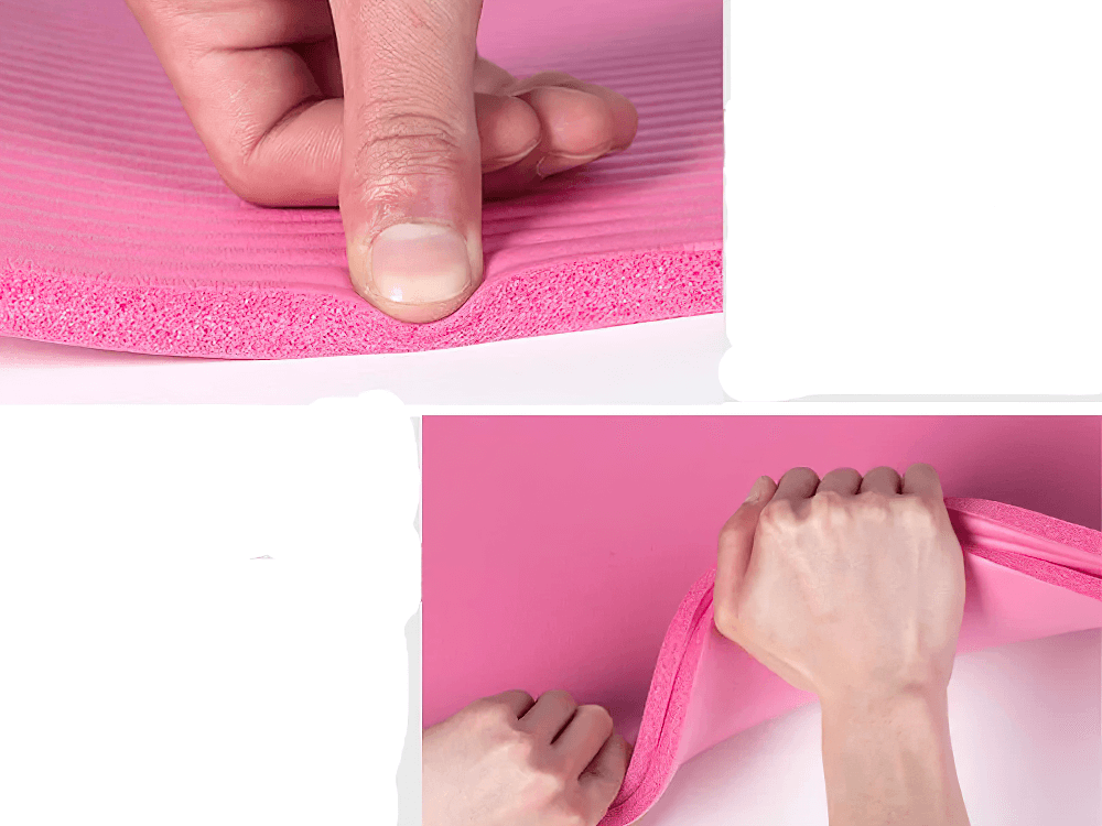 Close-up of a thick pink non-slip yoga mat showcasing durability and cushioning, ideal for fitness and floor exercises.