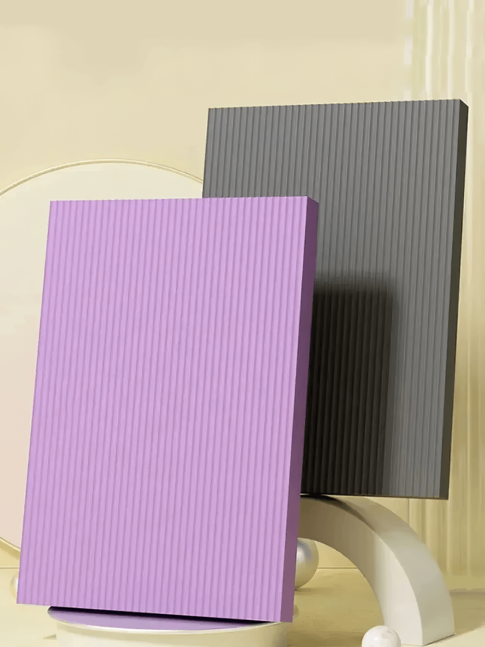 Purple and gray thick yoga mats with wave-pattern anti-skid surface, perfect for stable fitness routines and daily workouts.