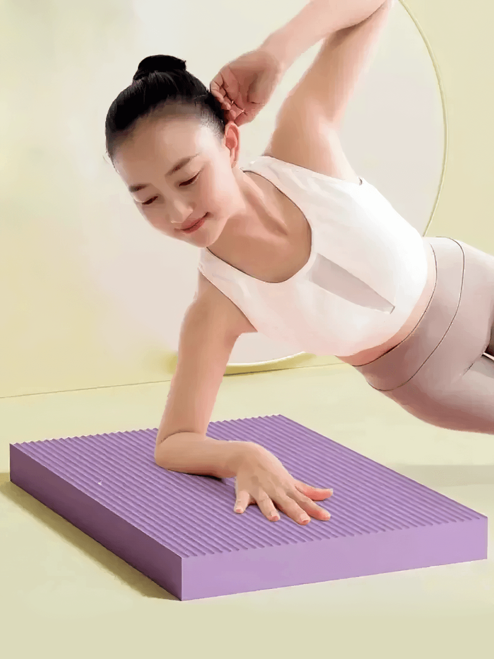 Person exercising on a thick purple yoga mat with anti-skid design, showcasing stability and comfort in a fitness routine.