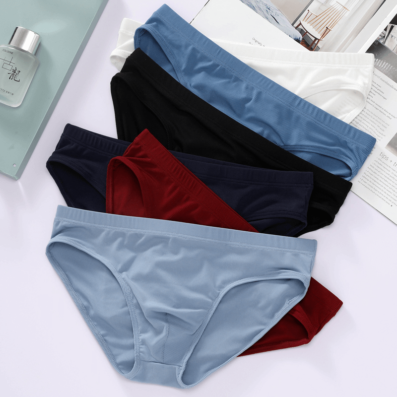 Collection of men's thin breathable ribbed briefs in assorted colors: white, blue, black, navy, maroon; low-rise casual underwear.