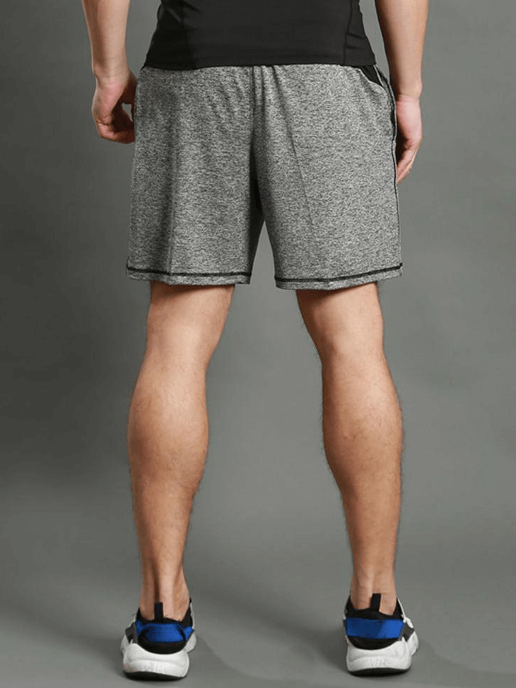Back view of men's thin breathable workout shorts in gray, featuring quick-dry polyester fabric and drawstring for comfort during runs.