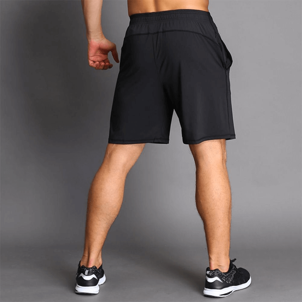 Man wearing thin breathable workout shorts, perfect for running with quick-dry, lightweight polyester fabric and drawstring waist.