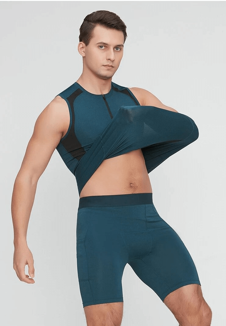 Man wearing a tight quick-drying sporty men's tank top, SF1731, ideal for running and fitness. Features a round neck and sleeveless design.