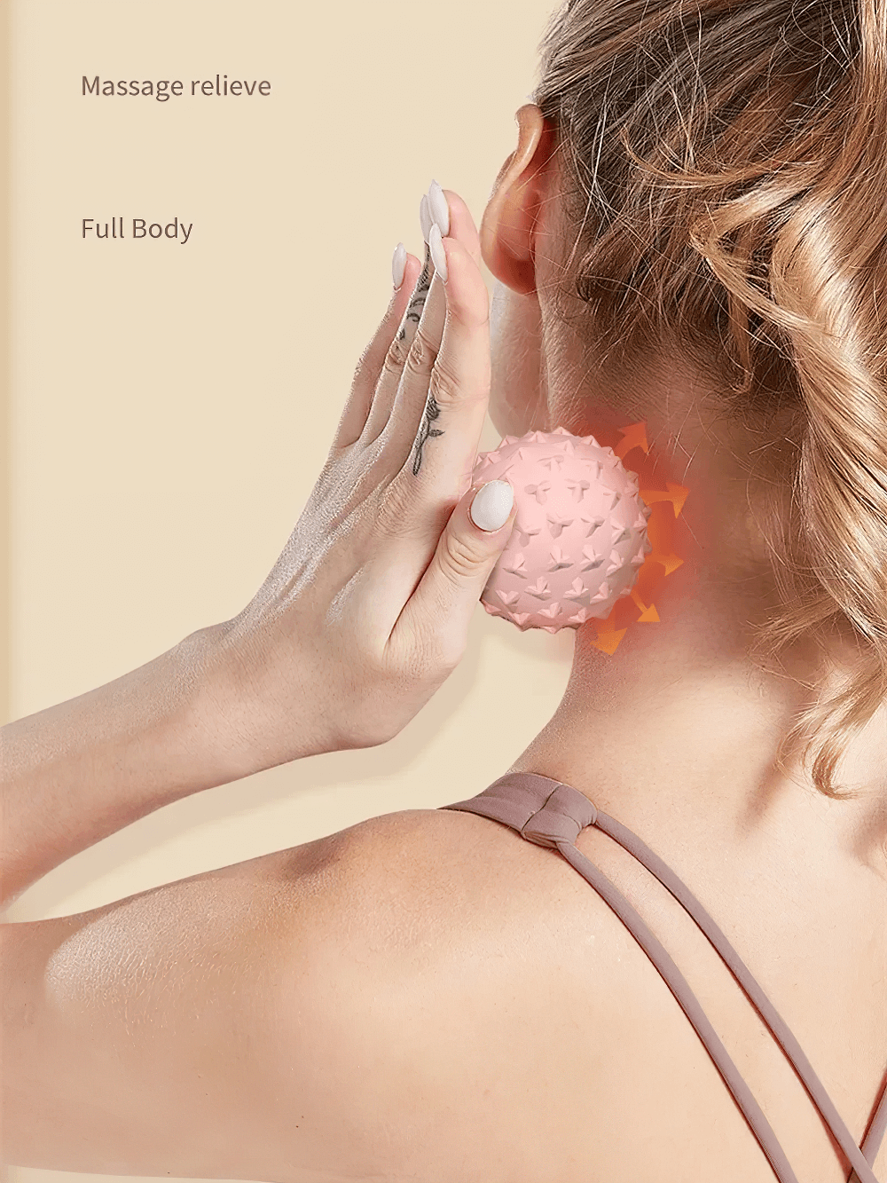 Using a pink TPE yoga massage ball for neck muscle relaxation and trigger point relief.