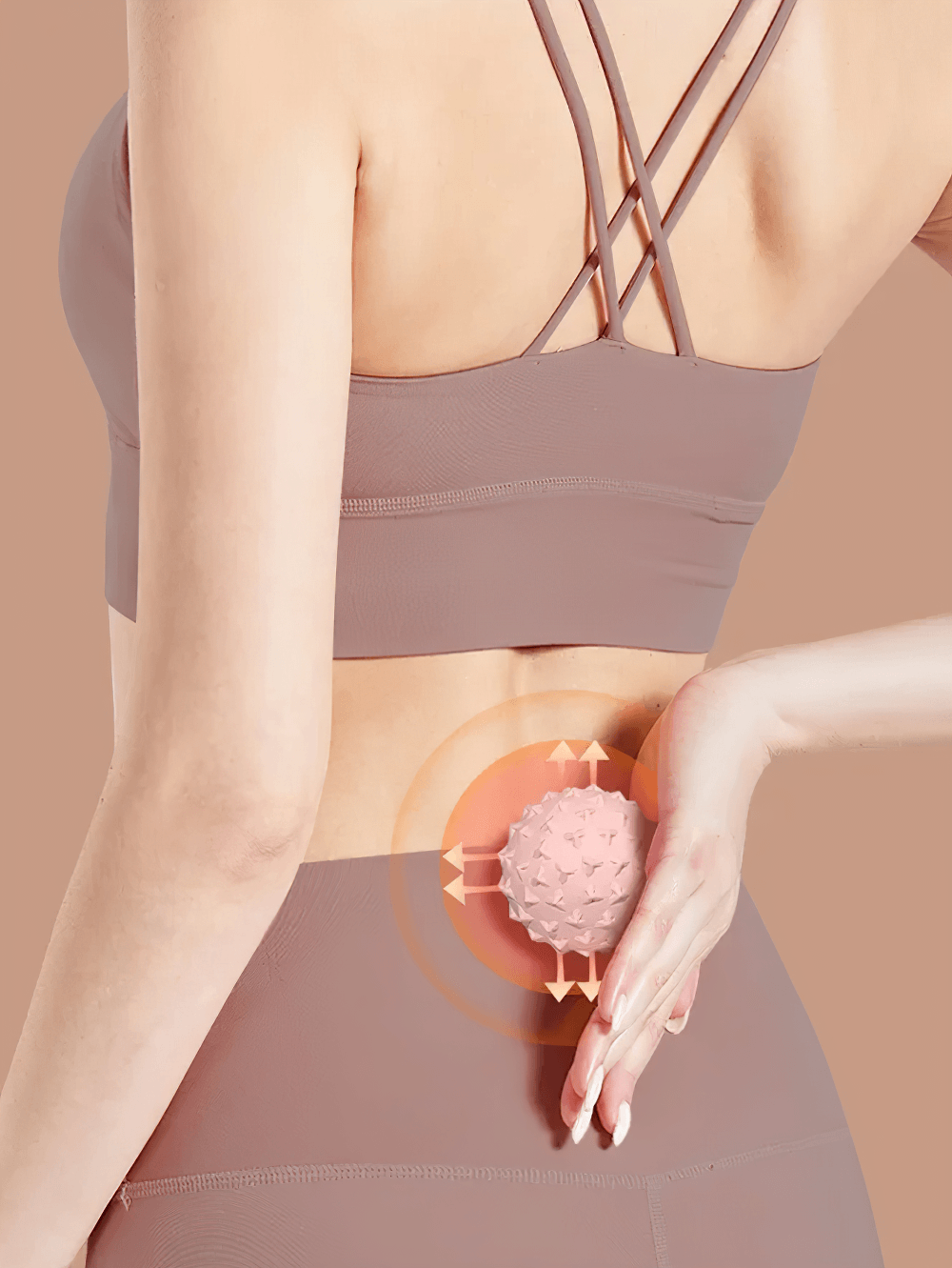 Woman using TPE mini yoga massage ball for back pain relief and muscle relaxation.