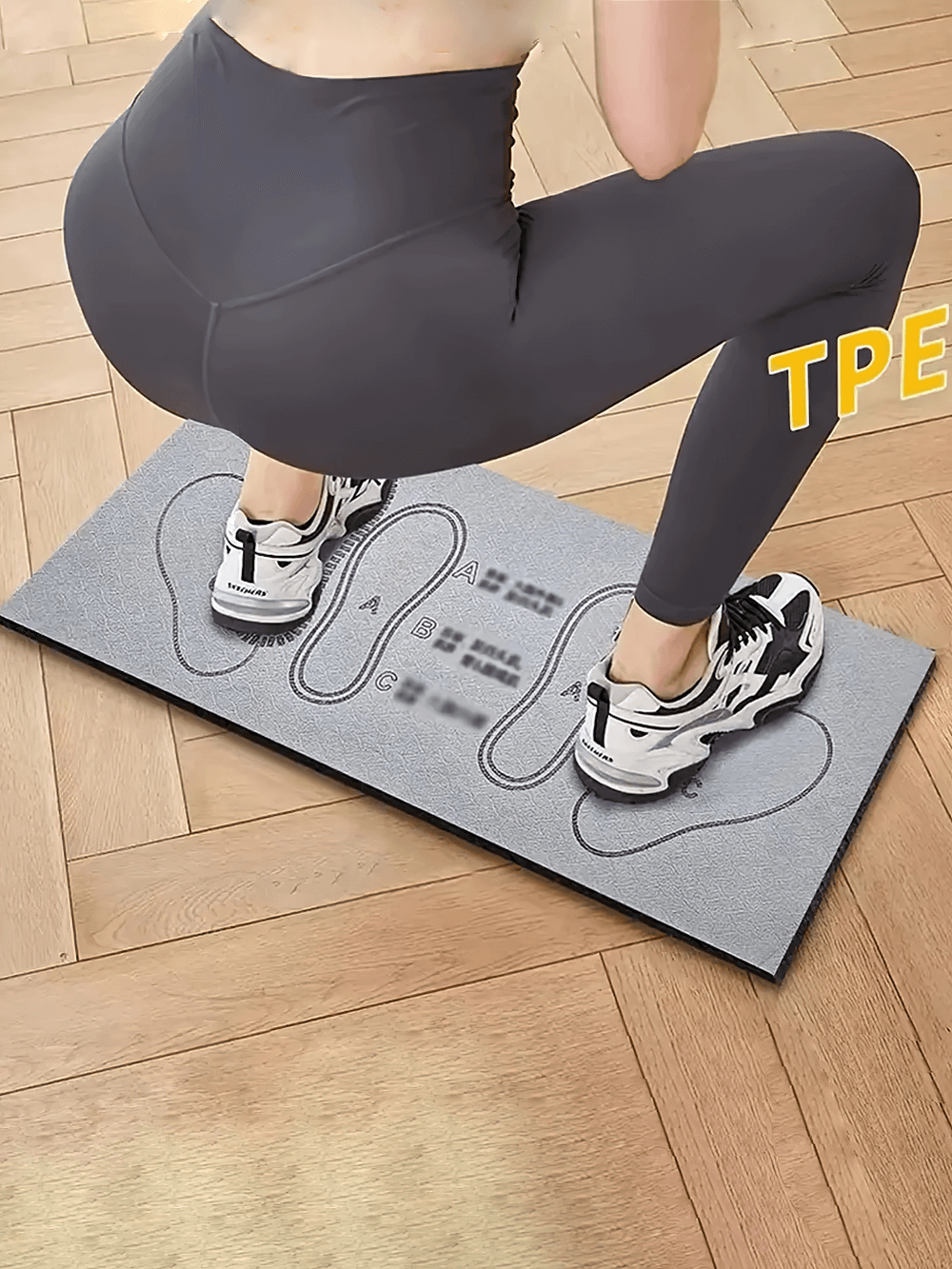 Person using TPE squat mat for leg and glute workout, showcasing non-slip stability, home fitness solution.