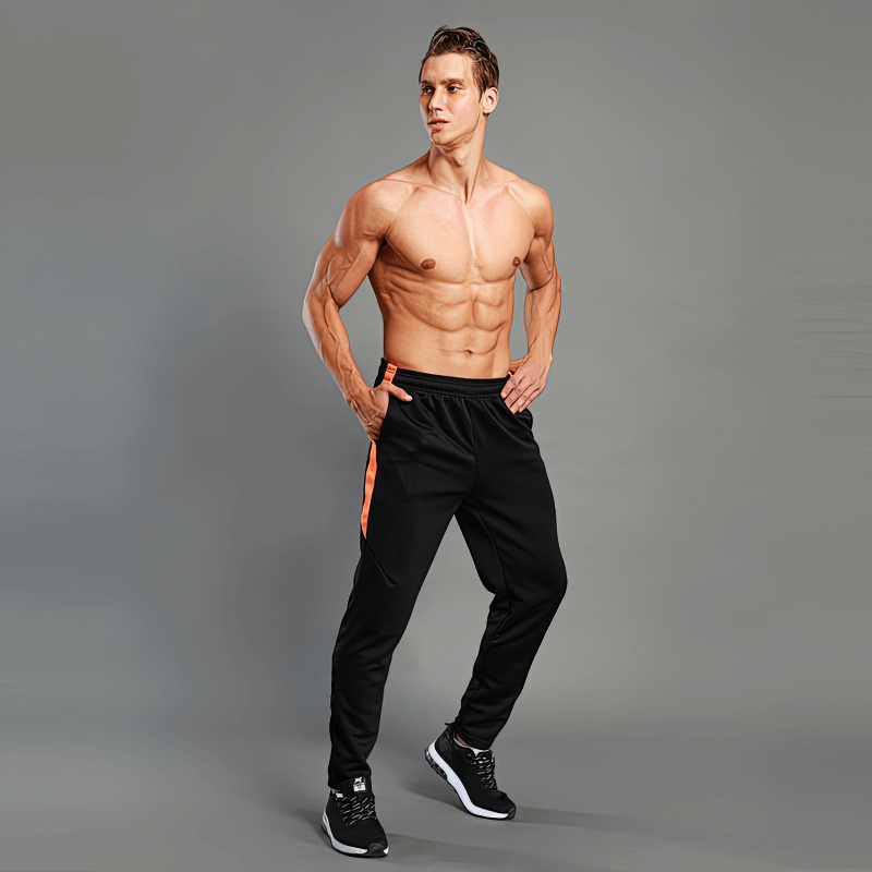 Athletic man modeling Training Breathable Elastic Men's Running Pants SF1356, featuring stretchy spandex for superior mobility.