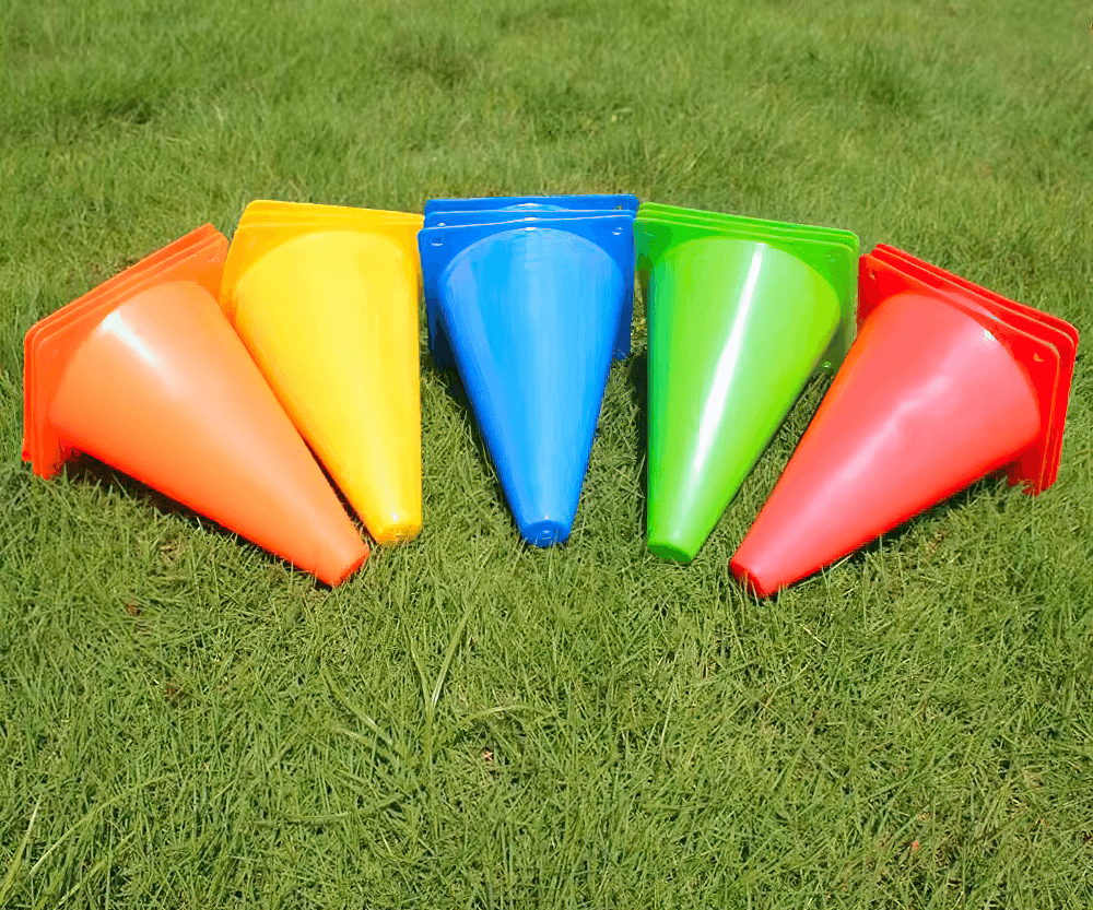 Colorful training cones for sports and agility drills with a sturdy design on grass, perfect for enhancing speed and coordination.