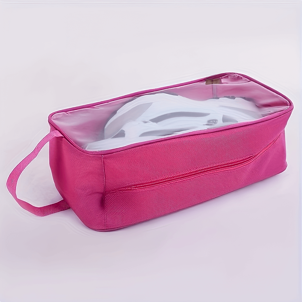 Hot pink transparent travel shoe storage bag with handle, featuring a clear window and zippered closure. Ideal for gym and travel use.