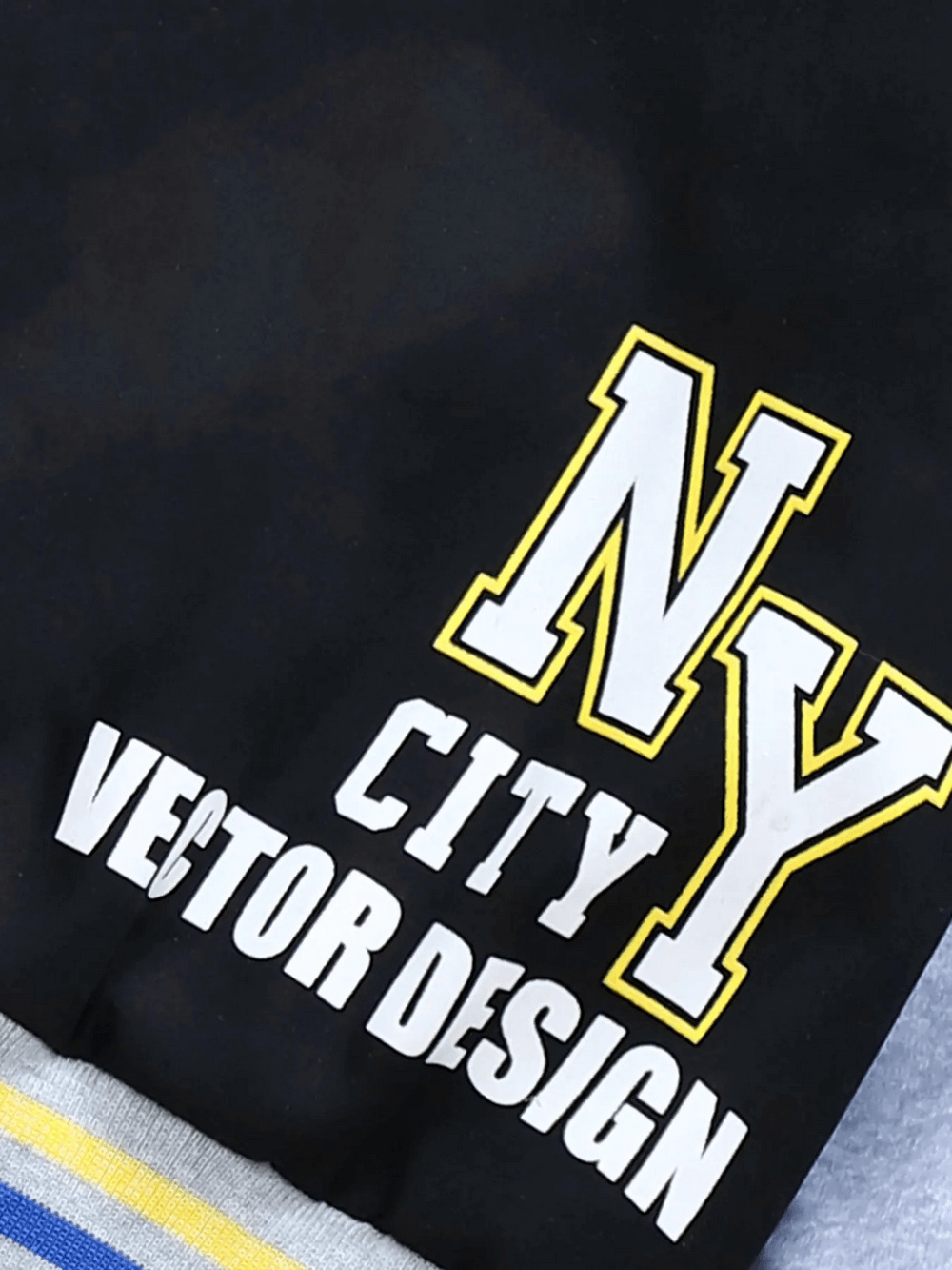 Bold NY letter print on trendy kids’ color-blocked baseball jacket SF3118, showcasing stylish design and sporty varsity appeal.