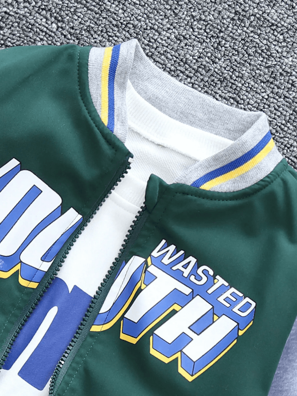 Trendy unhooded color-blocked baseball jacket for kids with bold letter print, SF3118, perfect for sporty and stylish outfits.