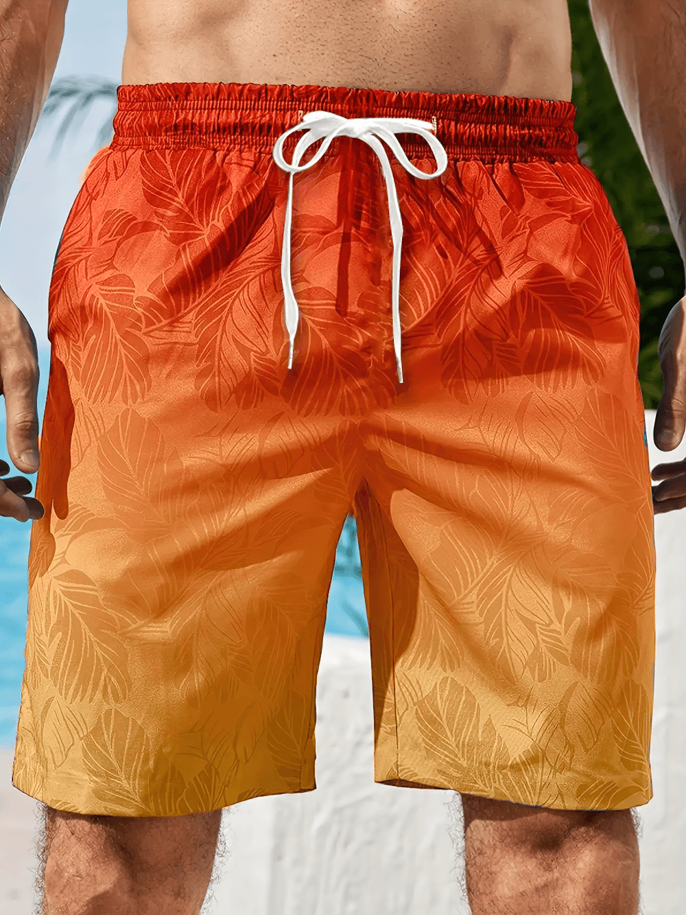 Alt Tag: Tropical Gradient Swim Shorts with Leaf Print - SF4495 orange ombre men’s swim trunks with tropical leaf print and drawstring