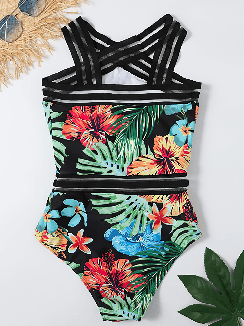 Tropical Print Cross Tape One Piece Swimsuit - SF4649 featuring bold floral and leaf print with cross-front straps.