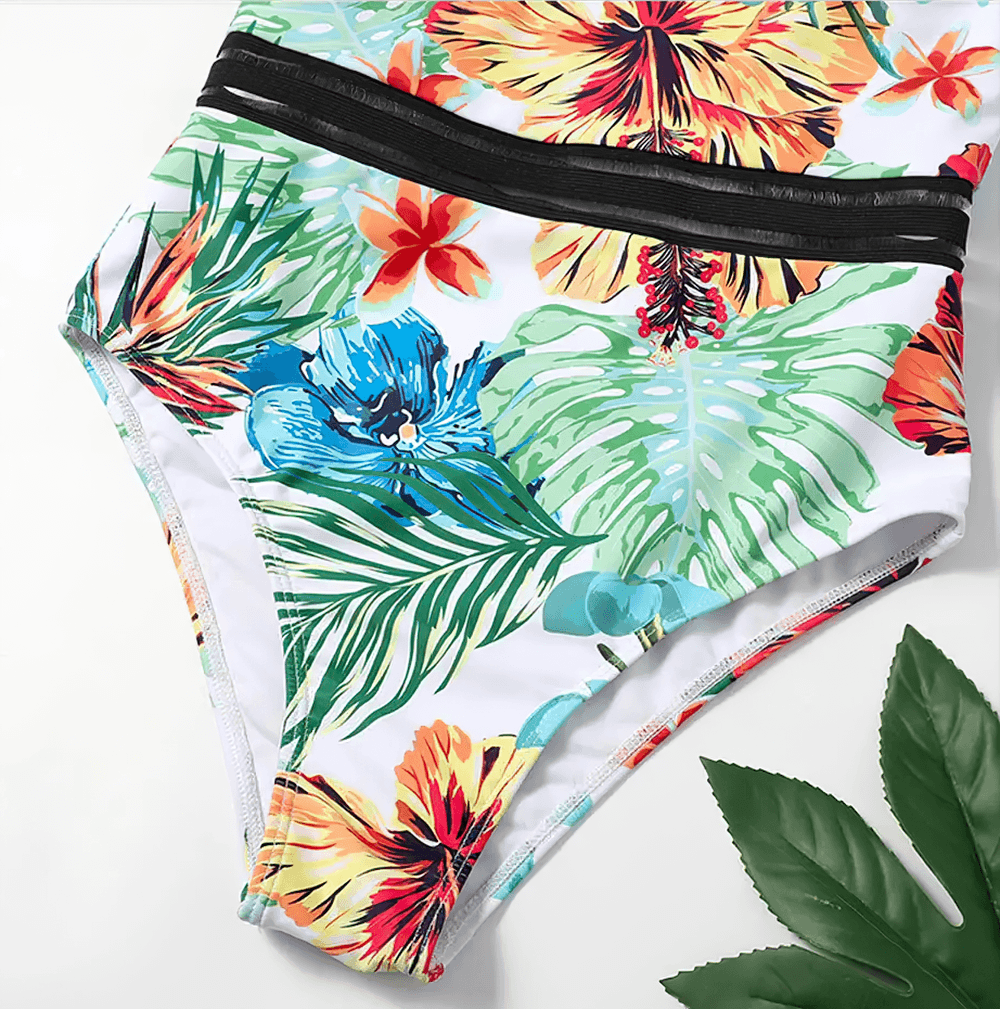 Tropical Print Cross Tape One Piece Swimsuit - SF4649 featuring vibrant floral print and mesh tape for stylish beach vibes.