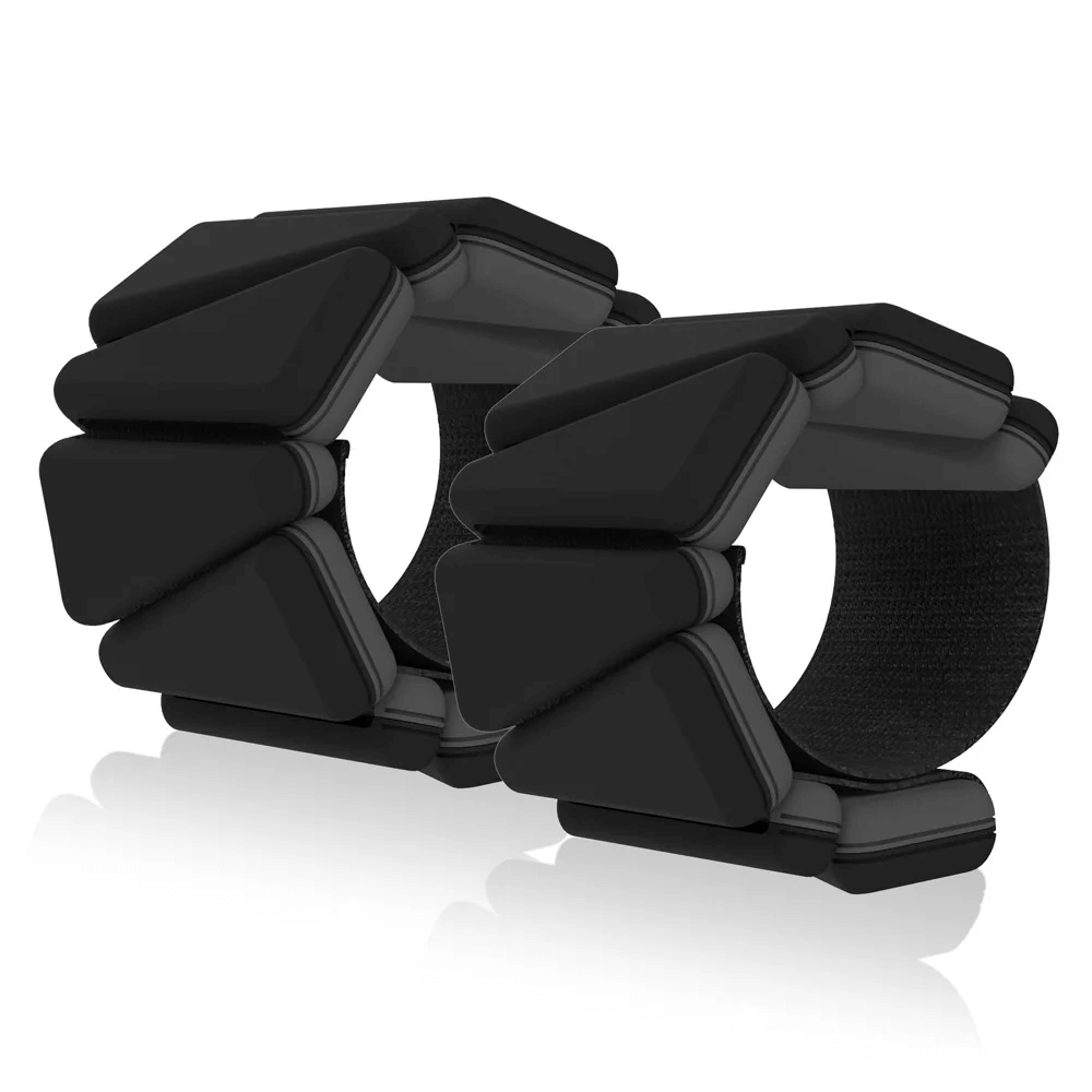 Black silicone weighted fitness bracelets with triangular blocks for wrist and ankle training.