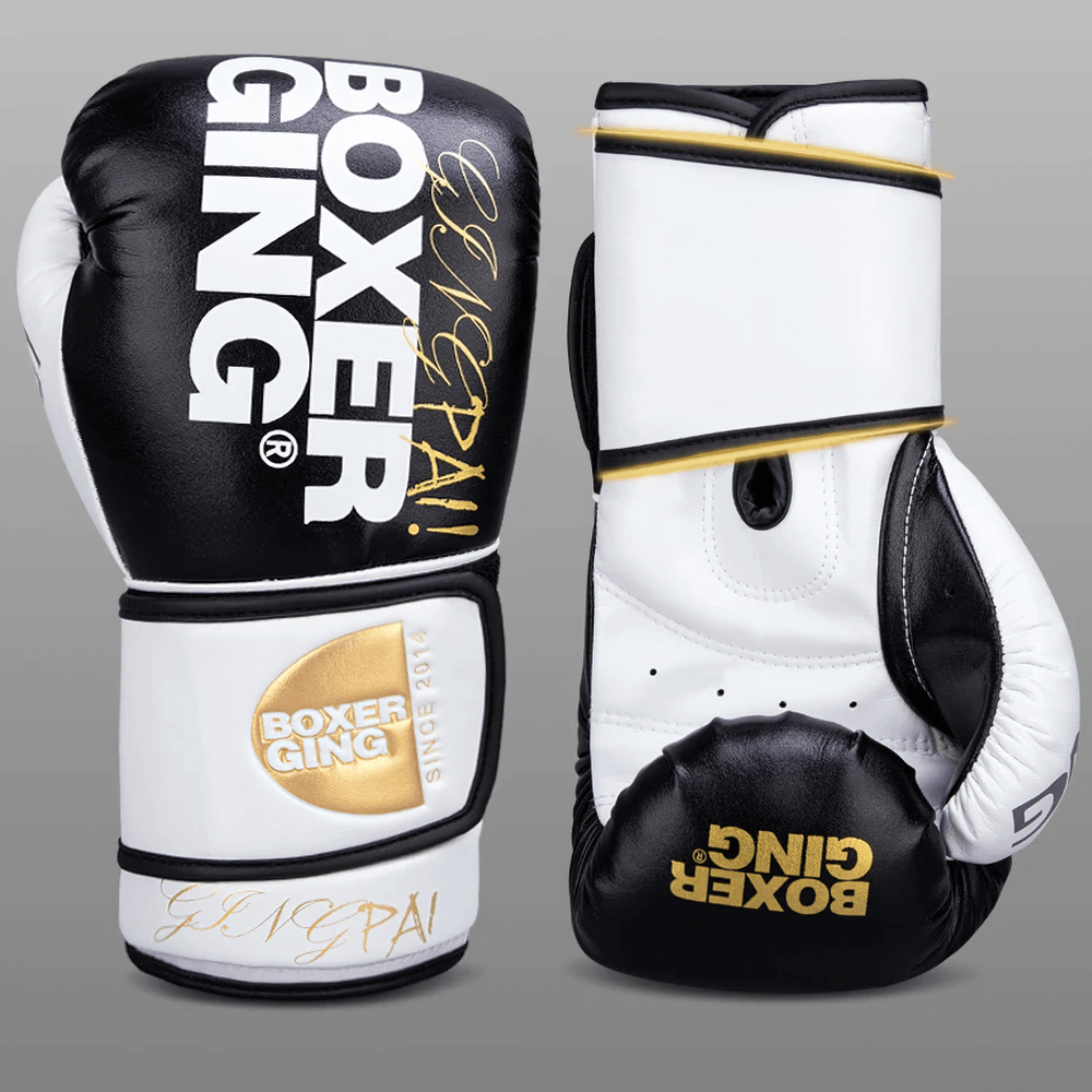 Two-tone leather boxing gloves for training and sparring with bold design and secure wrist support.