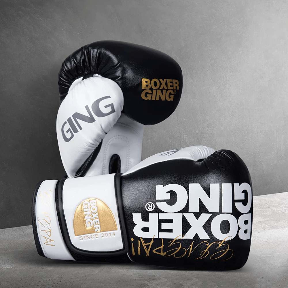Two-Tone Leather Boxing Gloves SF2699 with bold black and white design, ideal for training and sparring. Durable, secure wrist support.