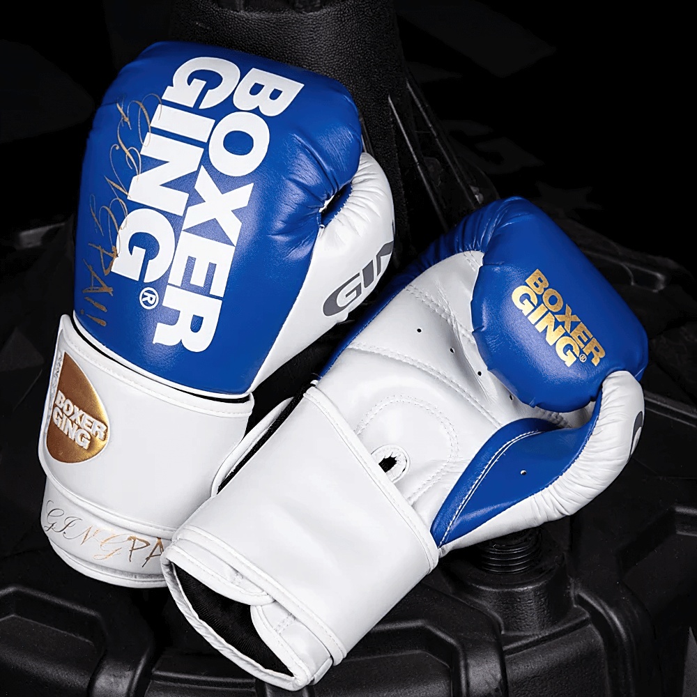 Two-Tone Leather Training Boxing Gloves SF2699 on exercise base. Durable, secure fit, shock absorption, stylish for sparring.