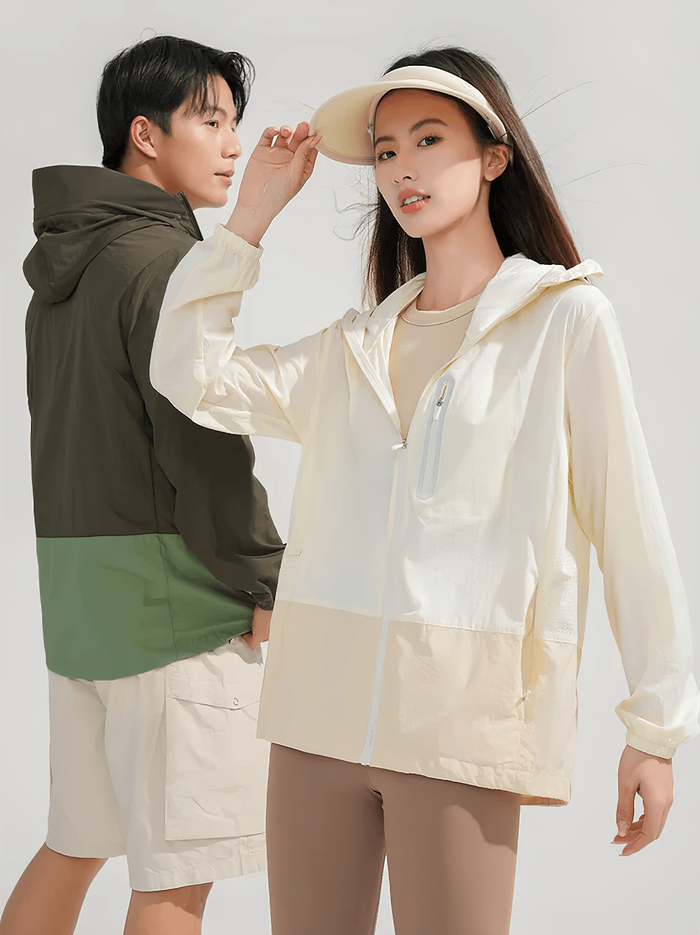 Unisex Anti-UV Hooded Outdoor Windbreaker Jacket - SF4760 worn by models, showcasing style and functionality.