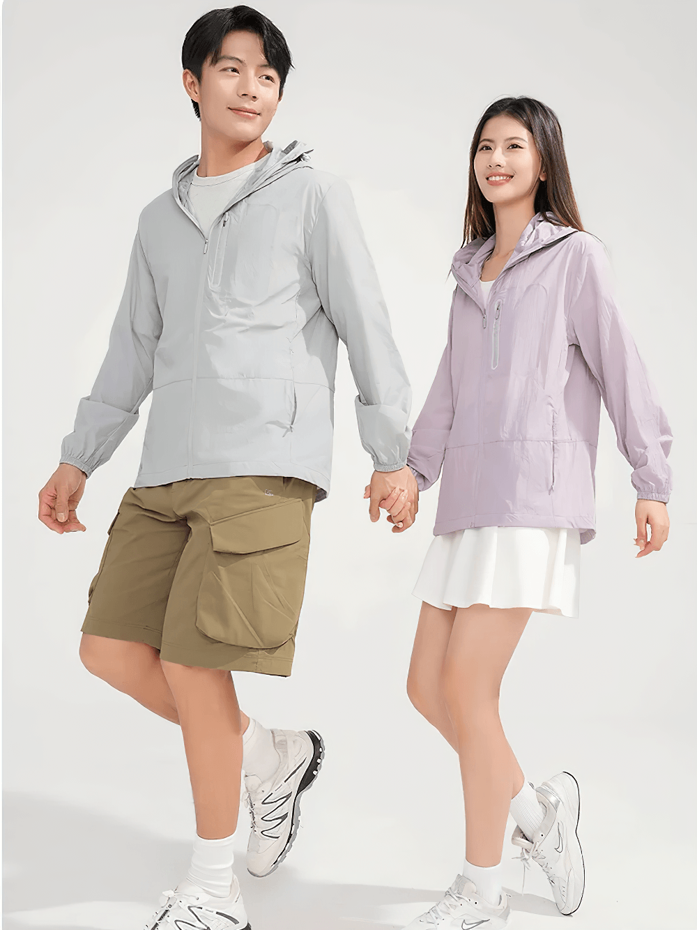 Unisex Anti-UV Hooded Outdoor Windbreaker Jacket - SF4760 showcased on a male and female model outdoors.