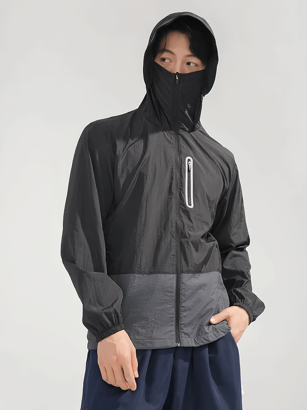 Unisex Anti-UV Hooded Outdoor Windbreaker Jacket - SF4760 modeled by a man in a stylish outdoor setting.