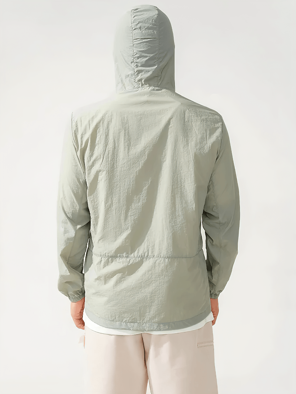Back view of the Unisex Anti-UV Hooded Outdoor Windbreaker Jacket - SF4760 in light green.