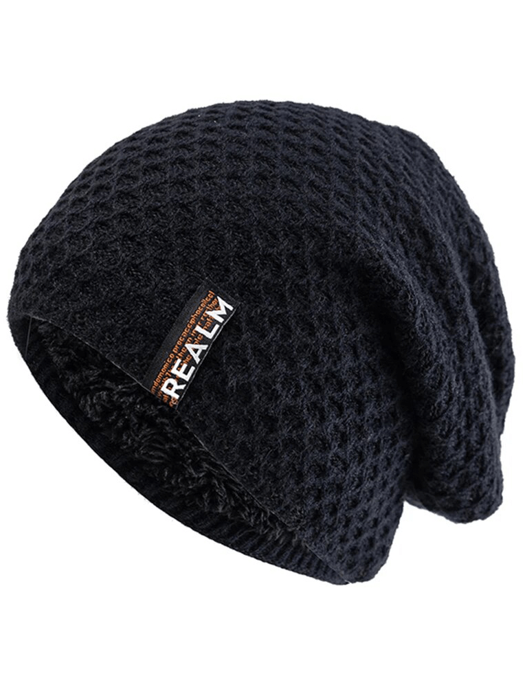 Unisex black knitted hat with letter label, thermal lined for warmth, featuring a stylish dot pattern. Ideal for outdoor adventures.