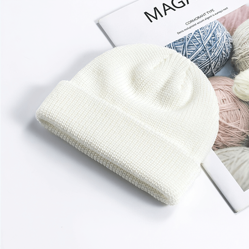 Unisex solid color knitted brimless hat - SF1393, perfect for warmth and comfort with soft cotton material, ideal for outdoor activities.