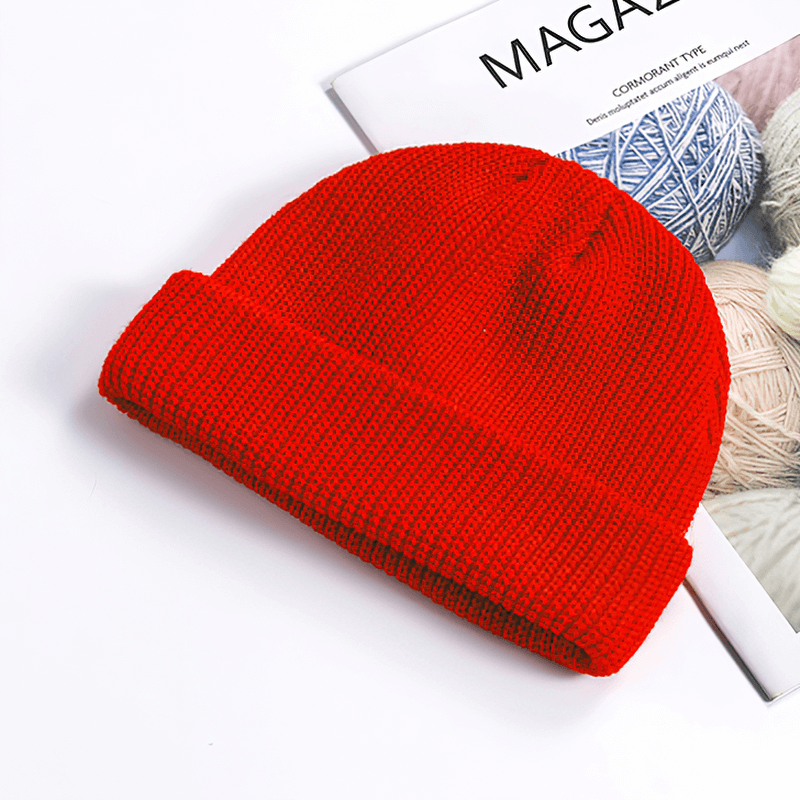 Unisex red knitted brimless hat on magazine, perfect for warmth and style, SKU SF1393, made of cotton for outdoor use.