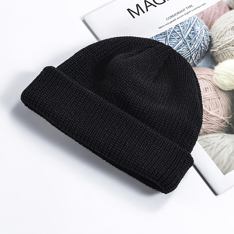Unisex solid color warm knitted brimless hat SF1393 in black, perfect for outdoor activities, crafted from ultra-soft cotton.
