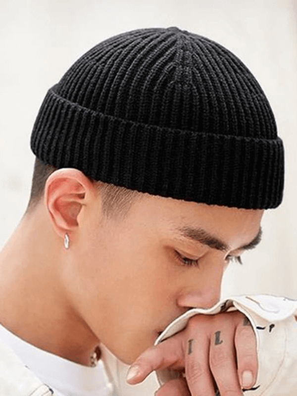 Unisex solid color warm knitted brimless hat SF1393 in black, perfect for keeping head and ears cozy with ultra-soft cotton material.