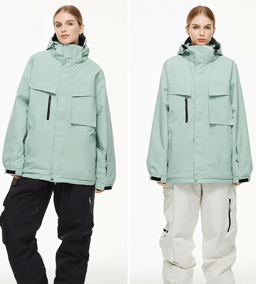 Model wearing mint green unisex waterproof ski jacket with utility pockets, showcasing hooded windproof design for winter sports.