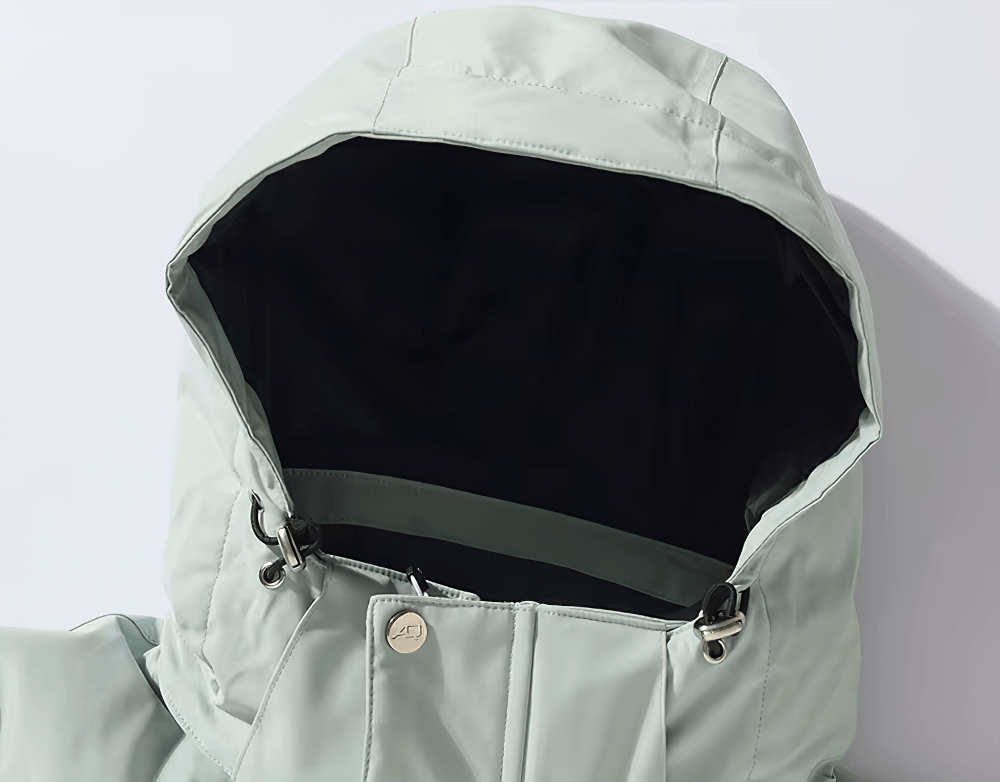 Unisex waterproof skiing jacket with hood, featuring windproof and breathable design for ultimate performance on slopes.