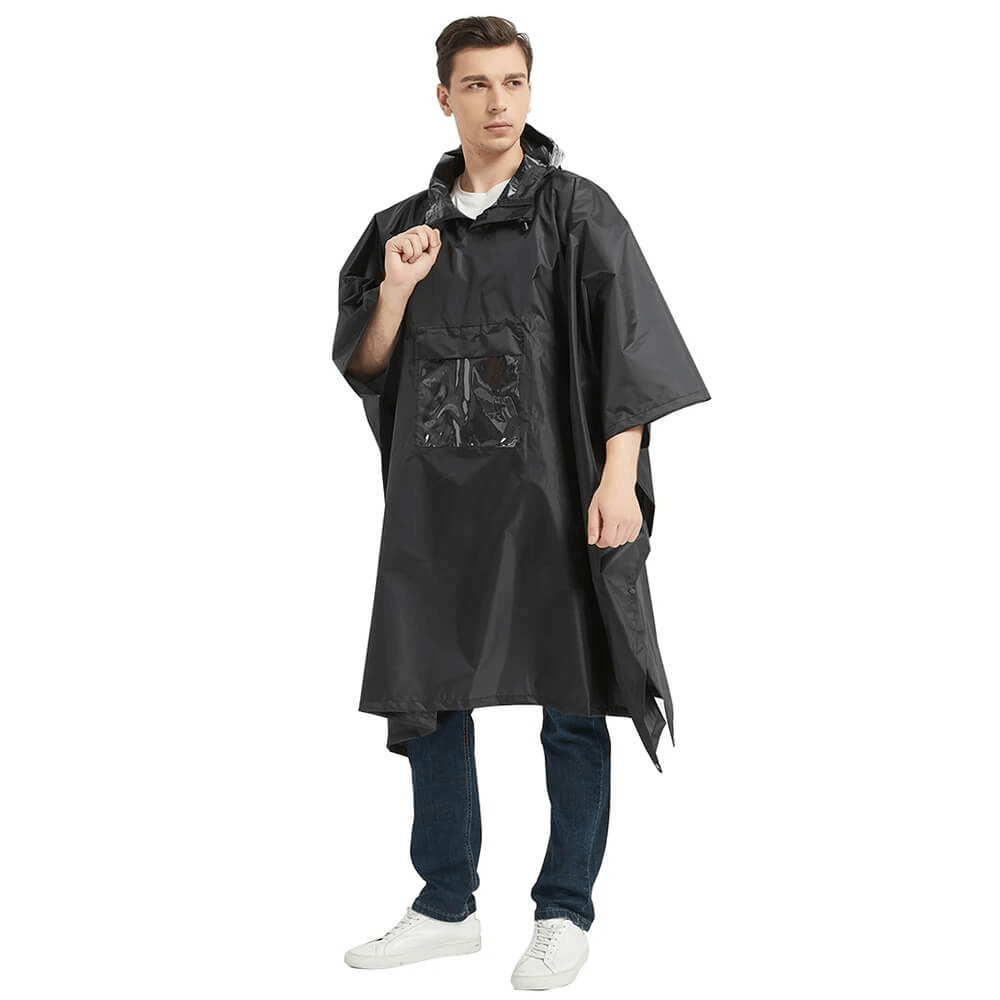 Unisex black waterproof hooded raincoat-poncho, perfect for outdoor activities, shown on a model. Lightweight, compact, and stylish.