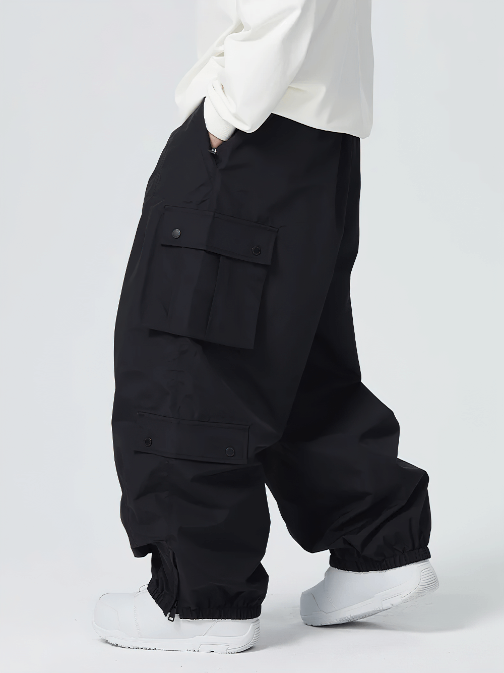 Model wearing Unisex Waterproof Snowboard Cargo Pants - SF4236 with large pockets, ideal for outdoor winter sports.